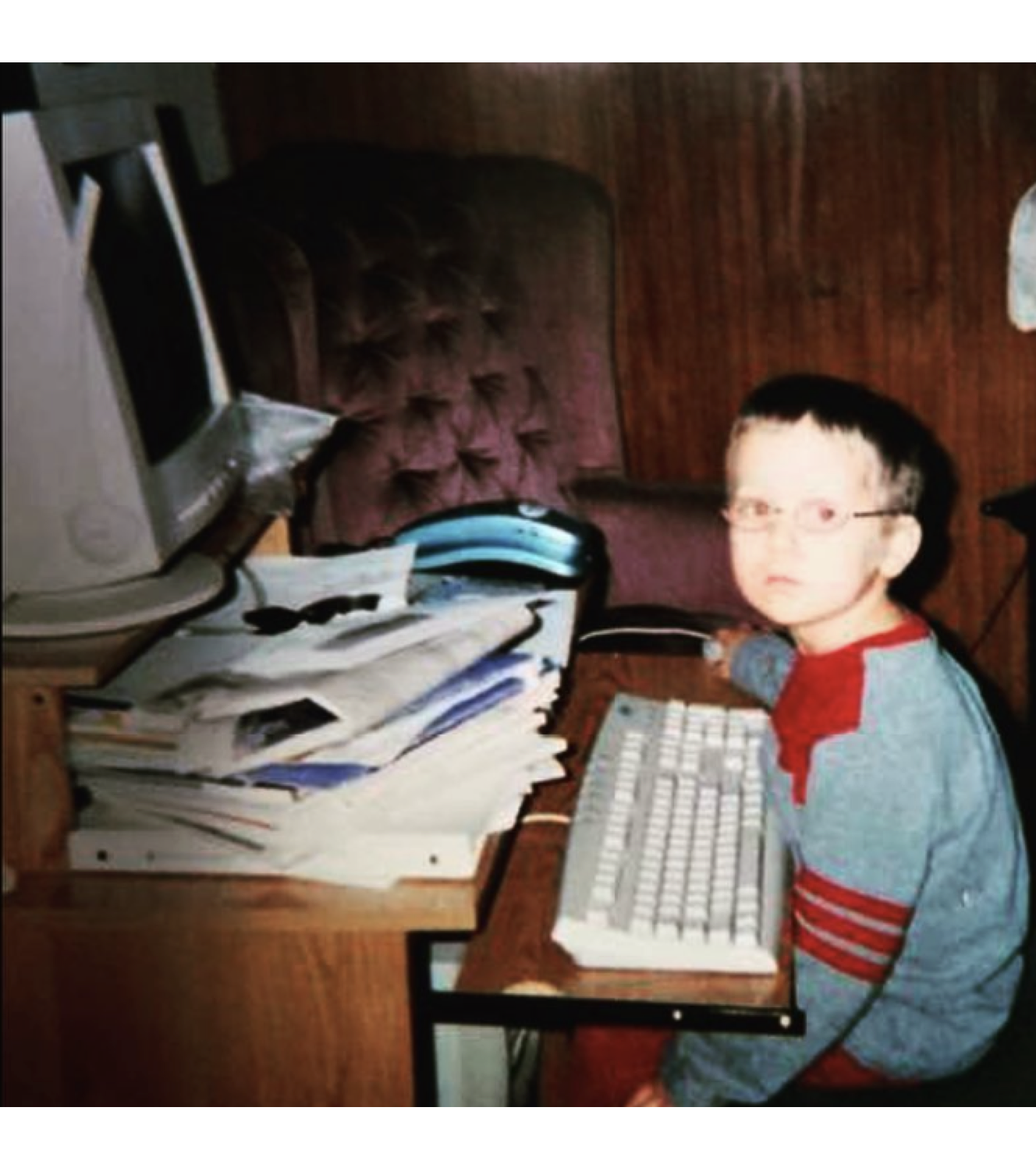 Wesley Roberts as a child sitting at a computer